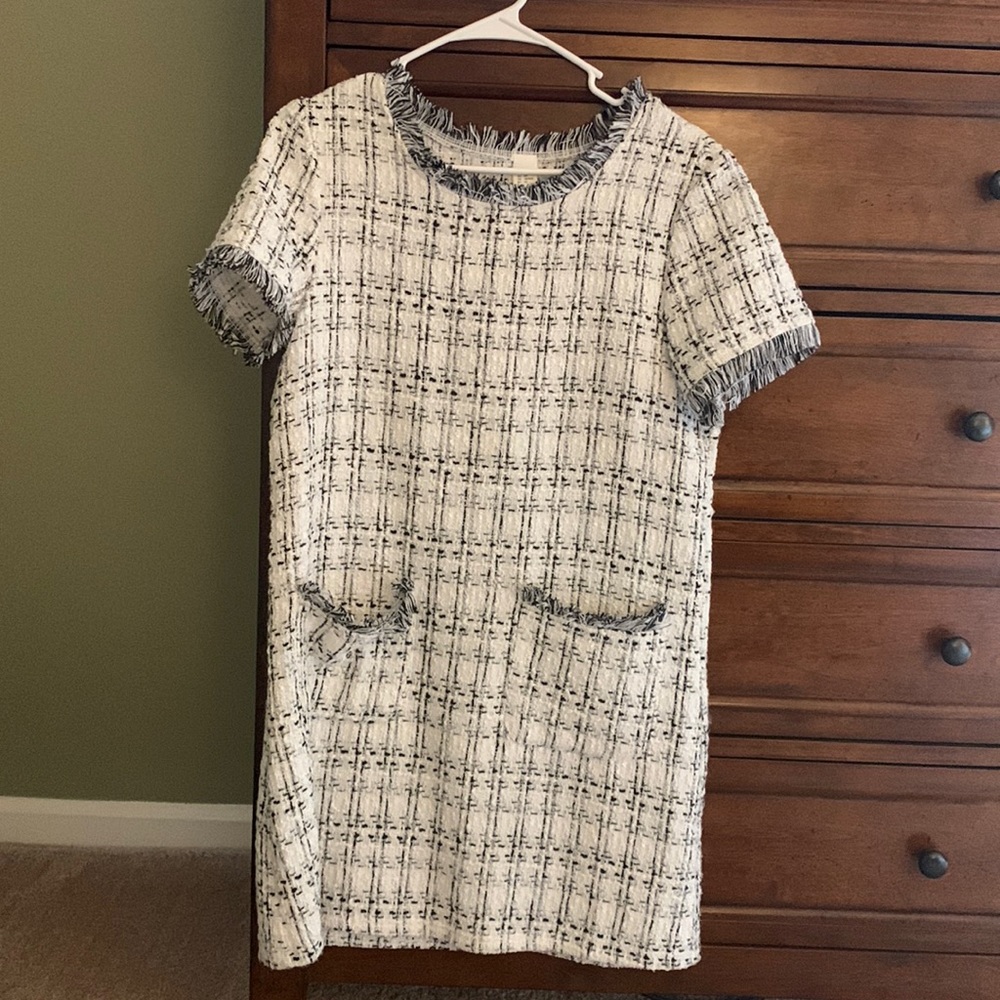 Short-sleeve tweed shift dress with pockets.